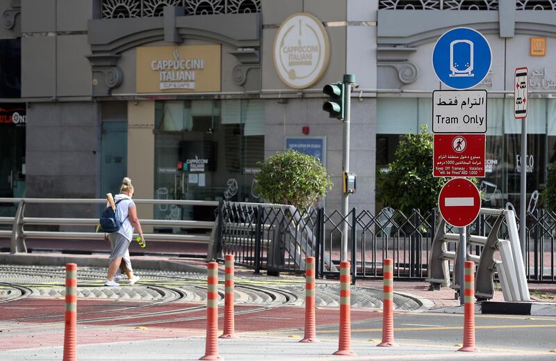 DUBAI, UNITED ARAB EMIRATES , April 05 – 2020 :- One of the Dubai Tram junction in Dubai Marina in Dubai. Dubai Metro and Tram shut down until further notice. UAE government told residents to wear face mask and gloves all the times outside the home. (Pawan Singh / The National) For News/Online/Instagram.