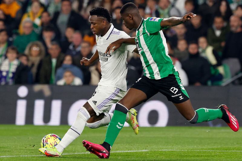 Real Betis's Luiz Felipe in action against Real Madrid's Vinicius Jr. EPA