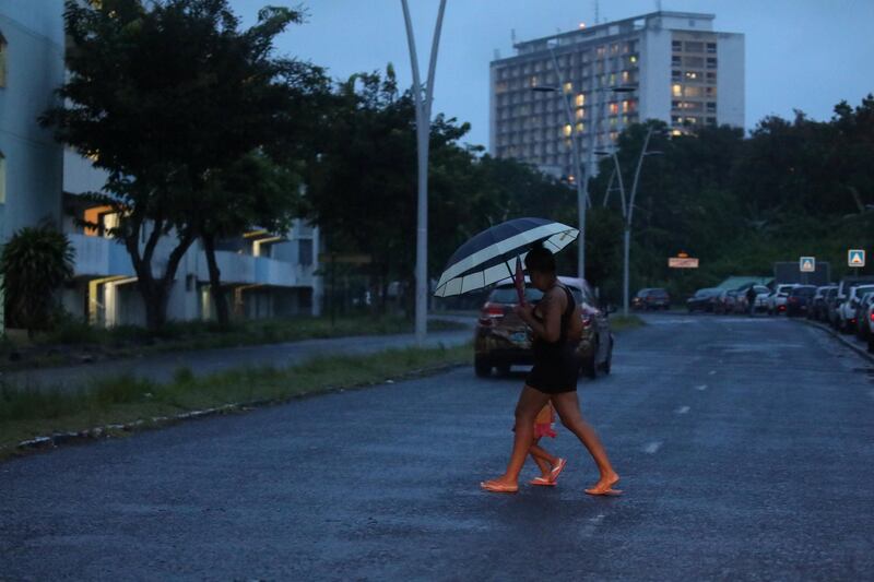 A woman crosses a street as Hurricane Maria approaches in Pointe-a-Pitre, Guadeloupe island. Andres Martinez Casares / Reuters