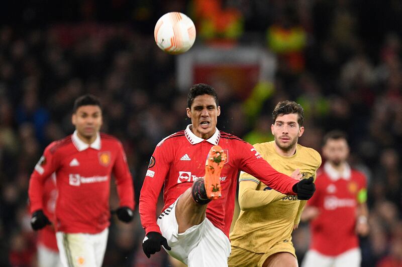 Raphael Varane 8 - Quick, cleans up well, peerless positioning. An clearance when the ball was running towards Lewandowski was vital. Blocked a 93rd minute Lewandowski shot. Top level performance for a top-level player.   AFP