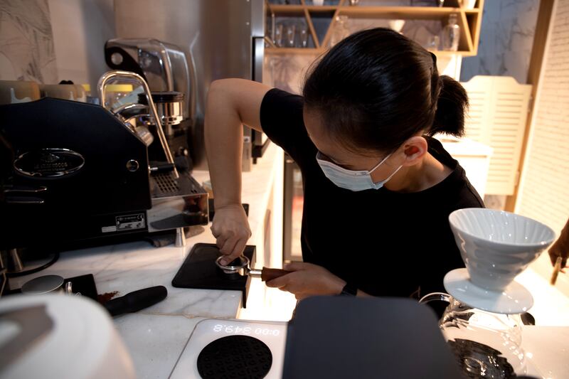 Mae Joaquino, barista at To Gather Cafe. About 60 per cent of the cafe's staff members are hearing-impaired