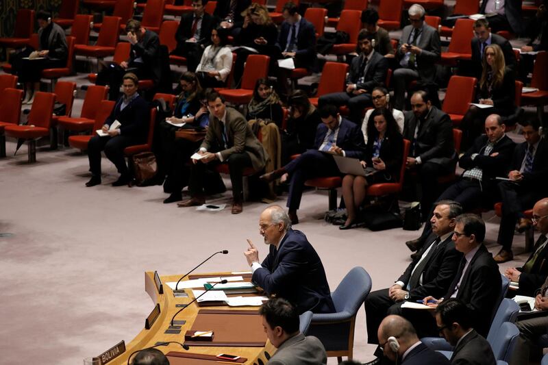 Syrian Ambassador to the United Nations Bashar al-Ja'afari (C) speaks after the vote on the resolution calling for a 30-day ceasefire for the purpose of allowing humanitarian aid to reach citizens in Syria at a Security Council meeting at United Nations headquarters in New York. Peter Foley / EPA