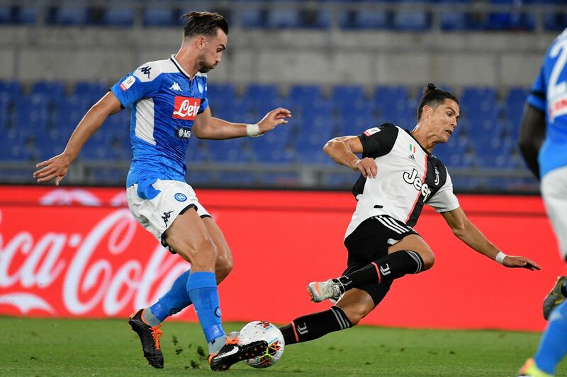 Ronaldo fights for the ball with Fabian Ruiz. Getty