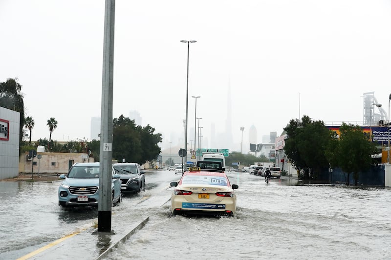 Flooding slows traffic in Al Quoz, Dubai. Pawan Singh / The National 