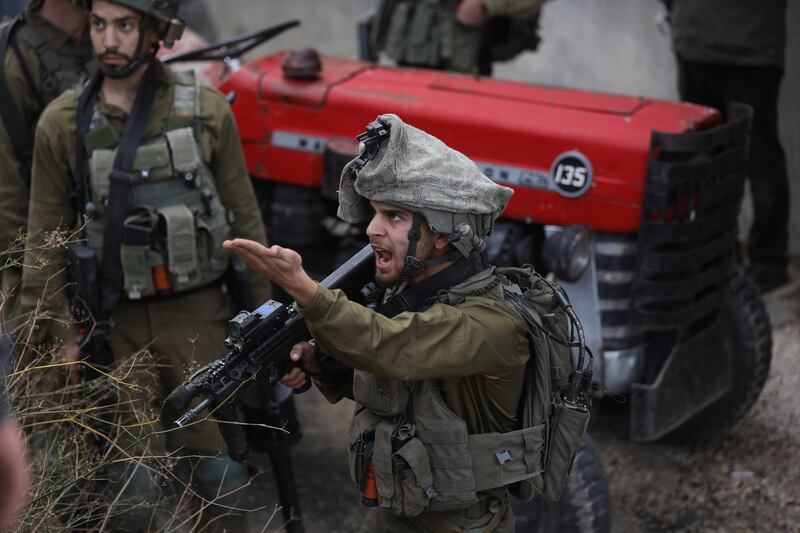 Israeli soldiers shot dead a Palestinian man who is said to have fired at them from a car. EPA