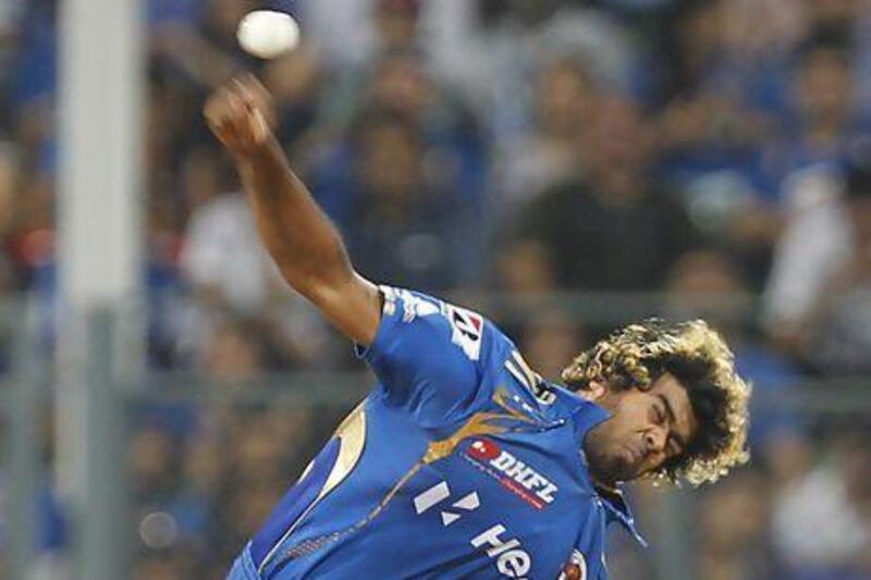 File picture of Lasith Malinga from 2012 IPL. The Mumbai Indians bowler had figures of 1-39 in his four overs. Vijayanand Gupta / Hindustan Times via Getty Images)