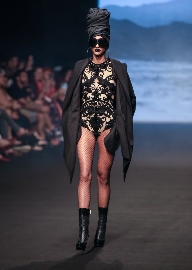 Known for his glittering couture creations, One's all-black collection was geared towards ready-to-wear.