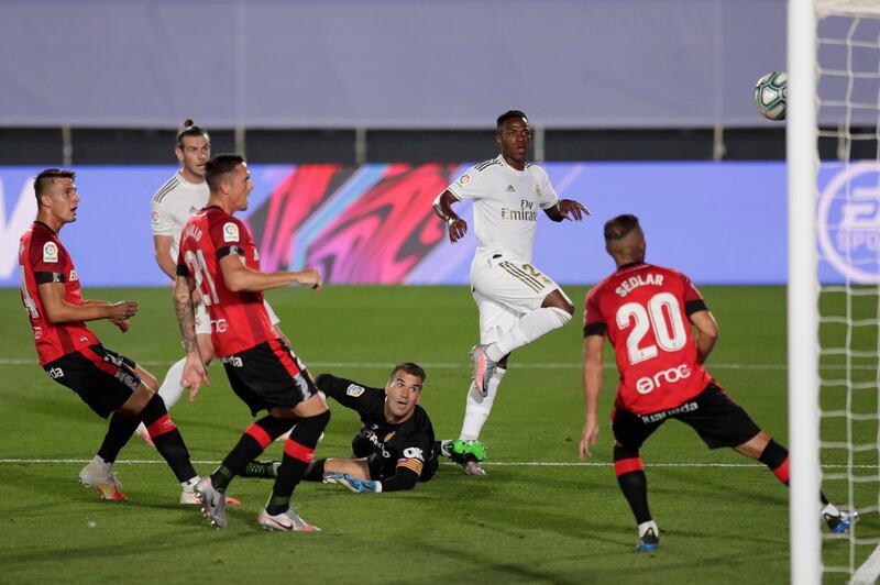 Real Madrid's Vinicius Junior scores the opening goal against Mallorca. AP
