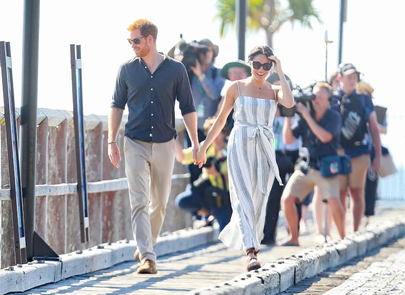Meghan and Harry walk down the wharf. Getty Images