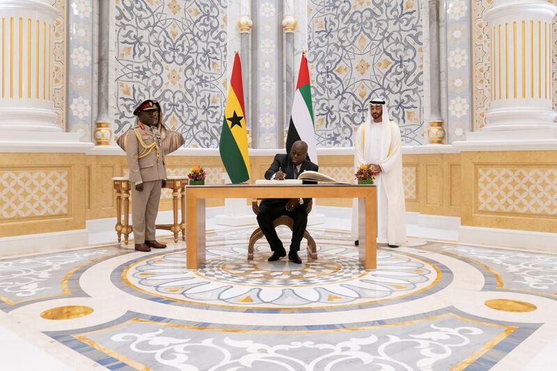 ABU DHABI, UNITED ARAB EMIRATES - November 18, 2019: HE Nana Addo Akufo-Addo, President of Ghana (C) signs the guest book during an official visit, at Qasr Al Watan. Seen with HH Sheikh Mohamed bin Zayed Al Nahyan, Crown Prince of Abu Dhabi and Deputy Supreme Commander of the UAE Armed Forces (R).

( Eissa Al Hammadi for the Ministry of Presidential Affairs )
---