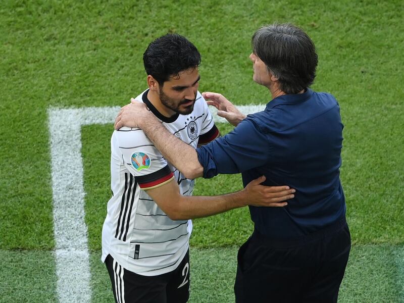 Germany's İlkay Gundogan with coach Joachim Low during the 4-2 win against Portugal. Reuters