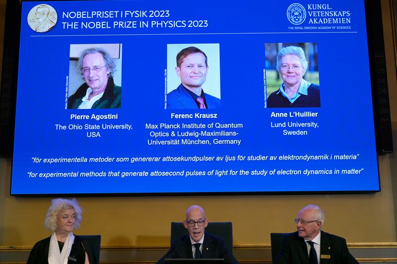 A panel announces the winners of the 2023 Nobel Prize in Physics, in Stockholm. AP