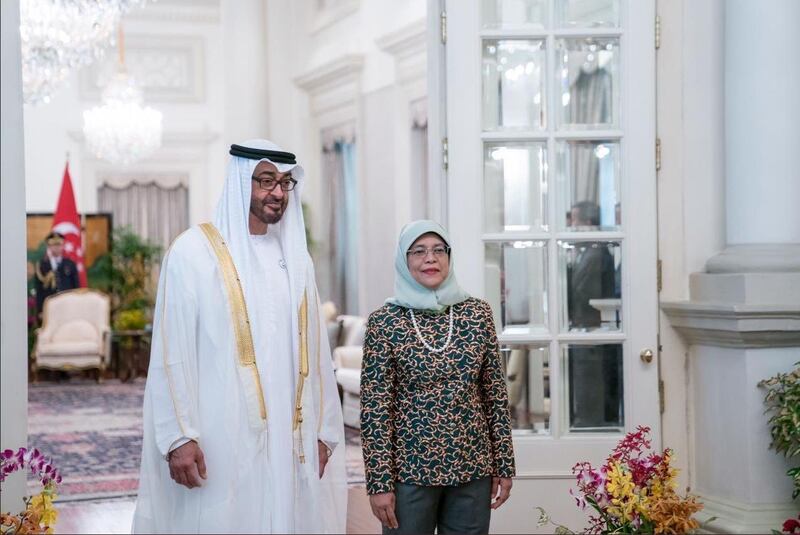 President Sheikh Mohamed meets Halimah Yacob, President of Singapore, during his official visit to the country in 2019. Photo: Sheikh Mohamed bin Zayed/Twitter