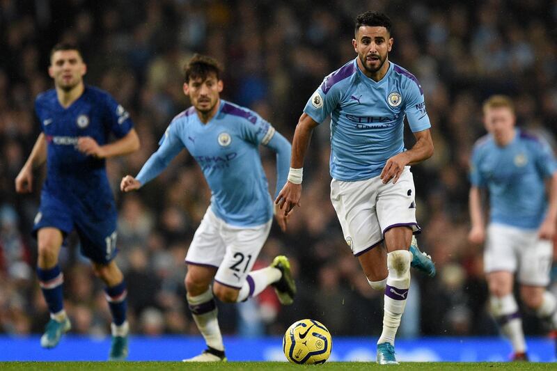 Manchester City's Algerian midfielder Riyad Mahrez runs with the ball. AFP