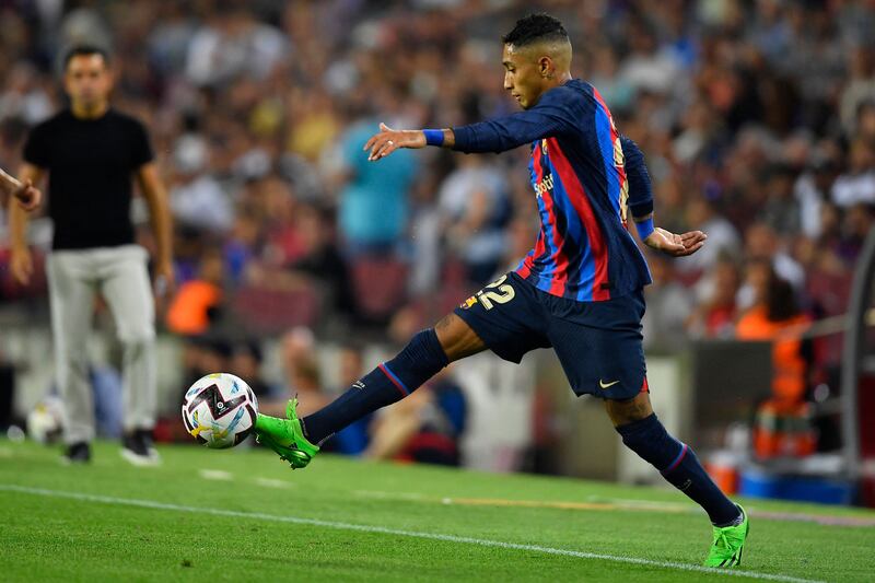 Raphinha - 5. Barca used the debutant to get at Rayo on the left wing, with limited success. AFP