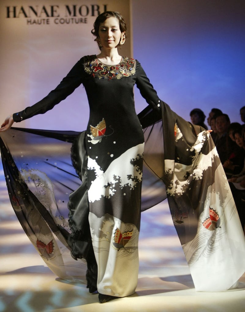 A Mori outfit from spring/summer 2003. The black silk dress shows her signature butterfly motif as well as hand-printed waves, inspired by Japanese painter Hokusai, known for his woodblock painting 'The Great Wave'. Reuters 