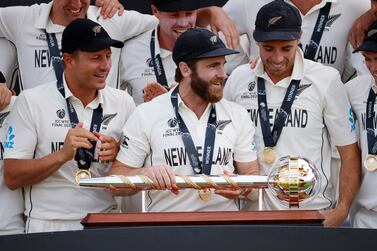 FILE PHOTO: Cricket - ICC World Test Championship Final - India v New Zealand - Rose Bowl, Southampton, Britain - June 23, 2021 New Zealand's Kane Williamson celebrates with the trophy after winning the final to become the ICC World Test Champions Action Images via Reuters / John Sibley / File Photo