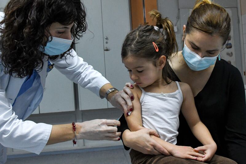 A health worker administers a measles vaccine in a hospital of Montenegro's capital Podgorica. AFP