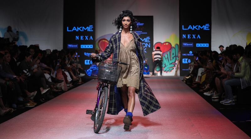 A shift dress and jacket combo on the Aneeth Arora runway. EPA