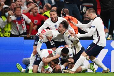 England's players celebrate after England captain Harry Kane scored 2-1 lead against Denmark at Wembley Stadium in in London, Britain, 07 July 2021.  England won 2-1 after extra time and will meet Italy in Sunday's final.   EPA / ANDY RAIN
