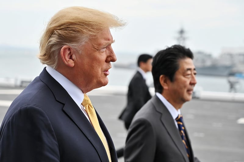 YOKOSUKA, JAPAN - MAY 28: US President Donald Trump gestures onboard Japan Maritime Self-Defense Force's (JMSDF) helicopter carrier DDH-184 Kaga at JMSDF Yokosuka base on May 28, 2019 in Yokosuka, Kanagawa, Japan. U.S President Donald Trump is on a four-day state visit to Japan, the first official visit of the Reiwa era.  (Photo by Charly Triballeau - Pool/Getty Images)
