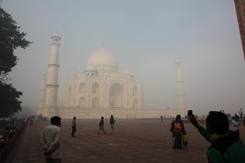 Taj Mahal, India's monument of eternal love is in Agra, India, winter and fog at the marble master piece. It was built by Mughal emperor Shah Jahan in memory of his beloved wife, Mumtaz Mahal. The Taj is made in Mughal style, is an universally admired masterpieces of the world's heritage. The construction began around 1632 and was completed around 1653, employing thousands of artisans and craftsmen. (Photo by Pallava Bagla/Corbis via Getty Images)