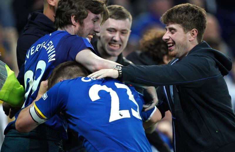 Fans mob Everton's Seamus Coleman after the win against Palace. PA