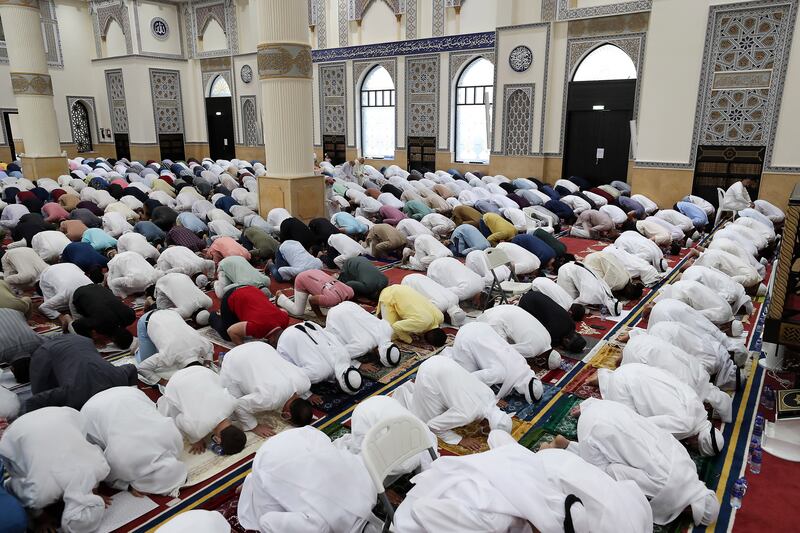 Prayers were held across the country early on Monday to mark the start of Eid Al Fitr. Pawan Singh / The National