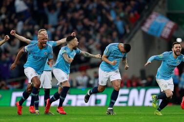 Manchester City's players celebrate winning the League Cup. Action Images via Reuters