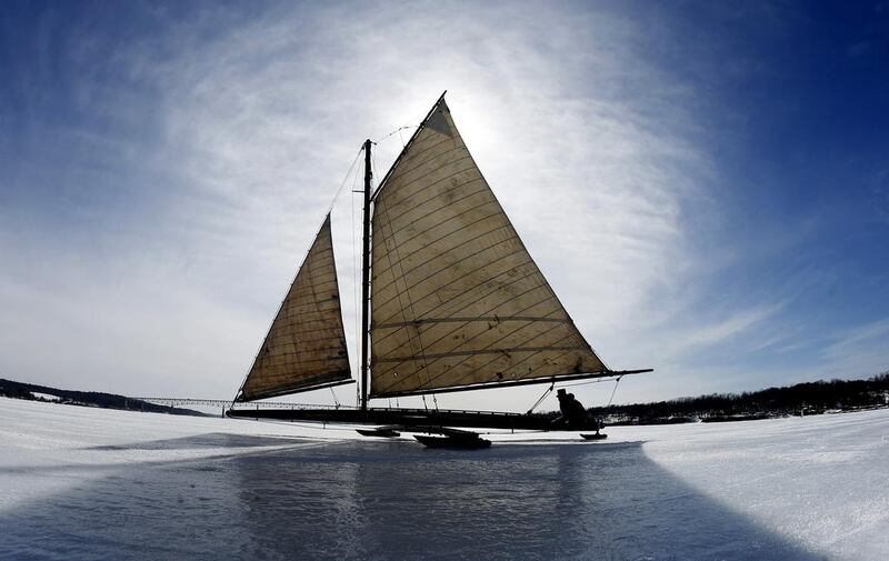 Brett Kolfrat from Cornwall, New York, a member of the Hudson River Ice Yacht Club New York, sails his ice boat Genevieve, built in 1908, on the frozen Hudson river. (Mike Segar / Reuters / March 7, 2014)