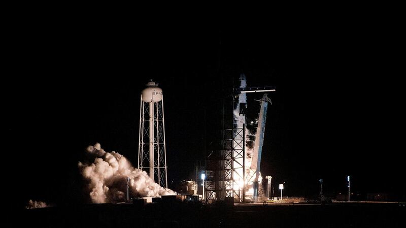 The SpaceX Falcon 9 rocket takes off with the company's Crew Dragon spacecraft onboard. AFP