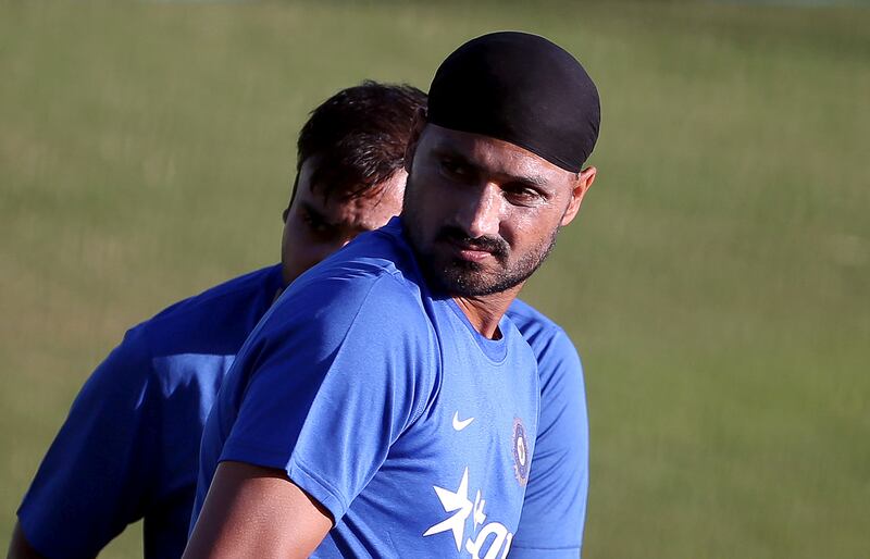 FILE PHOTO: India's Harbhajan Singh (R) and Amit Mishra attend a practice session ahead of their first Twenty-20 cricket match against South Africa in the northern Indian hill town of Dharamsala, India, October 1, 2015. REUTERS/Adnan Abidi/File Photo