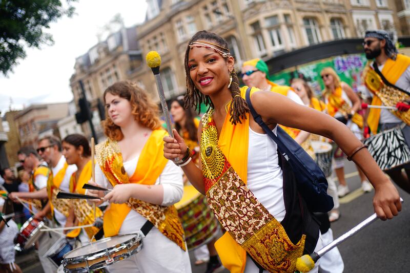 Musicians provide a Caribbean beat. PA