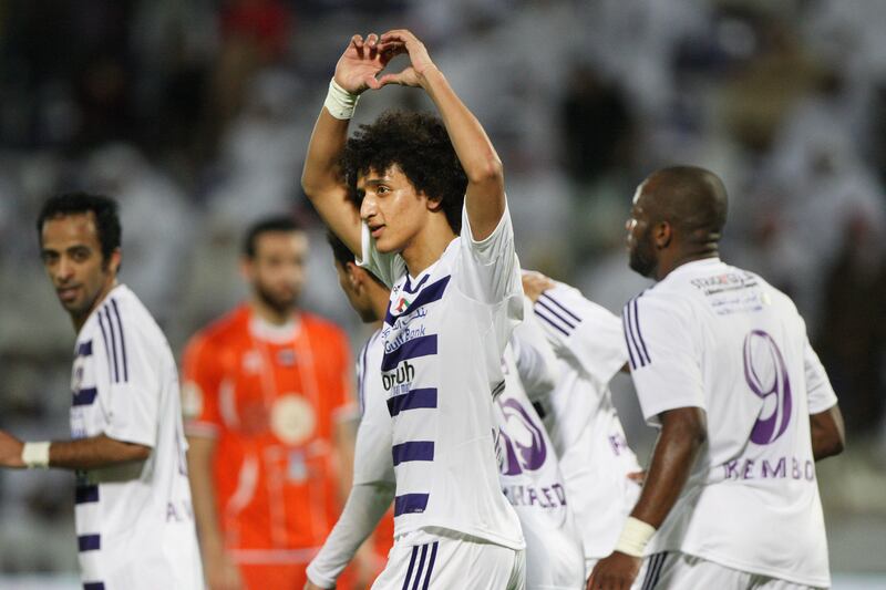 Al Ain, United Arab Emirates, Jan 26, 2013 - Omar Abdulrahman from Al Ain celebrate his goal (3-0) against  Ajman at Tahnon bin Mohamed Stadium.  ( Jaime Puebla / The National Newspaper ) 