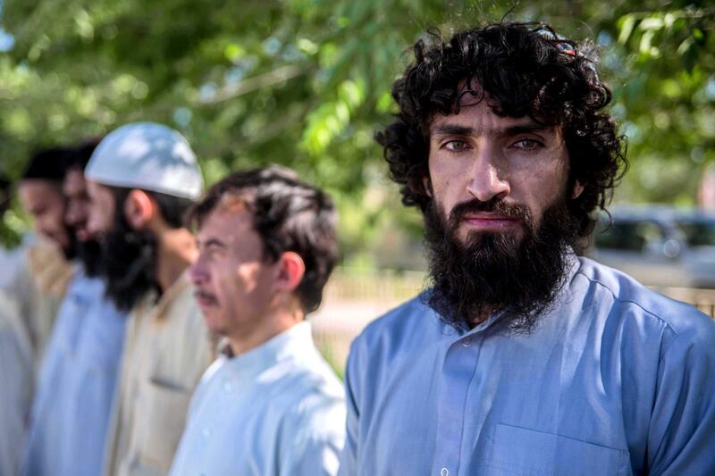 Taliban prisoners wait for their release at a government prison north of Kabul. 900 prisoners were released throughout Afghanistan on Tuesday, the last day of the Islamic festival of Eid-alFirt and the last day of the three-day ceasefire. Stefanie Glinski for The National