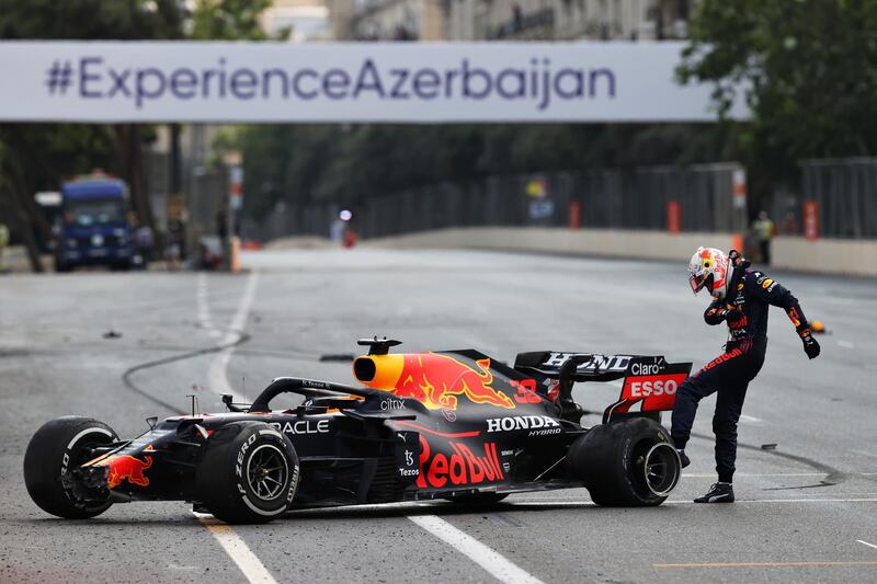 Red Bull driver Max Verstappen kicks his car after crashing late in the race. Getty