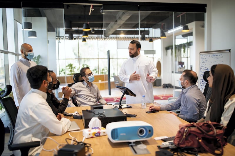 Ahmad Al-Zaini, chief executive and co-founder of Foodics with staff members.
