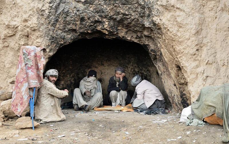 Opium addicts in Kunduz, Afghanistan. The area under opium poppy cultivation in Afghanistan rose by 7 per cent in 2014, keeping the country the top producer in the world, according to the latest UN survey.. Jawad Karger/EPA