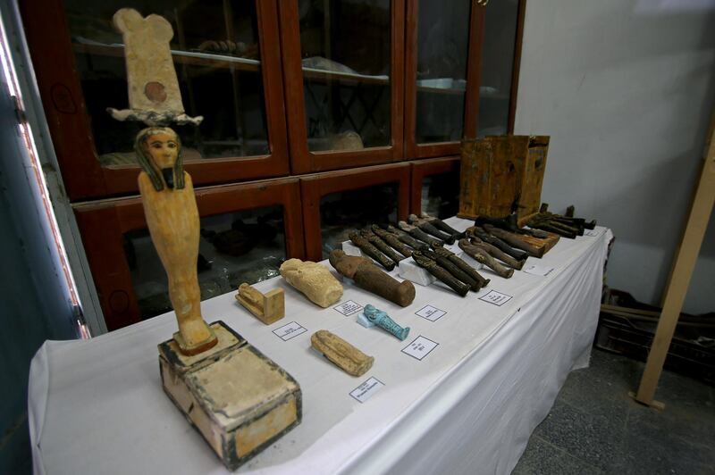 Artifacts, part of a recent discovery from the Saqqara necropolis, are seen south of Cairo, Egypt. REUTERS