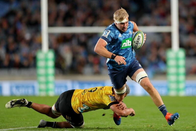 Josh Goodhue of the Blues makes a break during the Super Rugby match against the Hurricanes at Eden Park. Getty