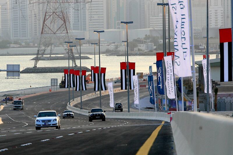 October 14, 2009 -- Abu Dhabi -- Sheikh Khalifa Bridge opened Wednesday, Oct 14th, 2009, allowing cars a new route off and on the island of Abu Dhabi, connecting Abu Dhabi and Saadiyat Islands and opening the Shahama-Saadiyat Highway.  (Rich-Joseph Facun / The National)  *** Local Caption ***  rjf-1014-saadiyatbridge007.jpg