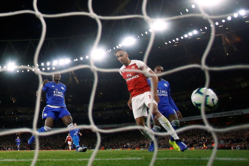 Soccer Football - Premier League - Arsenal v Leicester City - Emirates Stadium, London, Britain - October 22, 2018   Arsenal's Pierre-Emerick Aubameyang scores their third goal    Action Images via Reuters/Andrew Boyers    EDITORIAL USE ONLY. No use with unauthorized audio, video, data, fixture lists, club/league logos or "live" services. Online in-match use limited to 75 images, no video emulation. No use in betting, games or single club/league/player publications.  Please contact your account representative for further details.