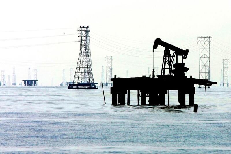 Brent oil, the benchmark for more than half of the world’s crude, tumbled from mid-June to a six-year low in January. Above, an oil pump at an offshore rig in Lake Maracaibo, western Venezuela. Jorge Silva / Reuters