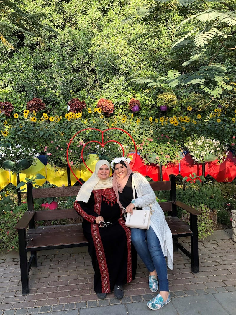 Sarah Afaneh, left, with her Palestinian grandmother at Dubai Miracle Garden