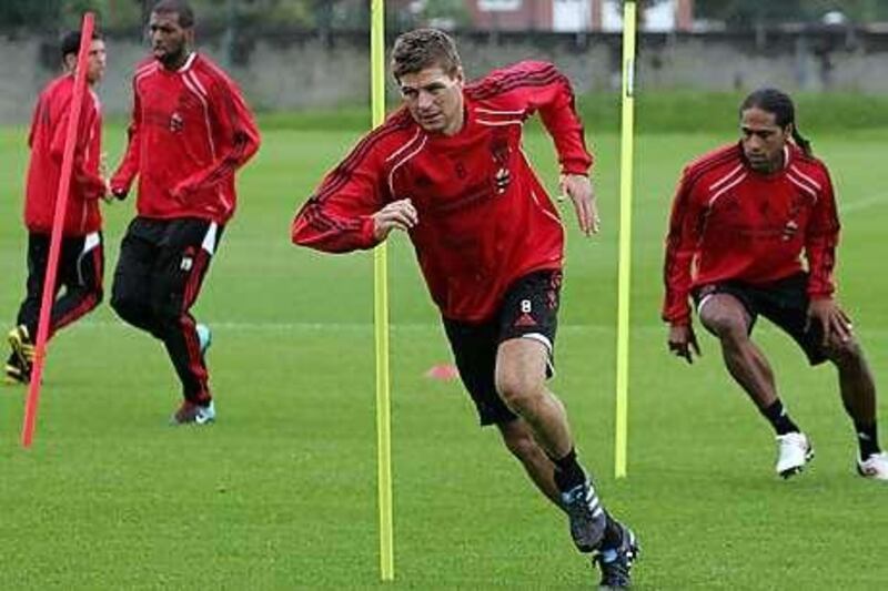Steven Gerrard, right, the Liverpool captain, trains with the rest of the squad ahead of last night's match against Robotnicki in the second leg of their third qualifying round for the Europa League.