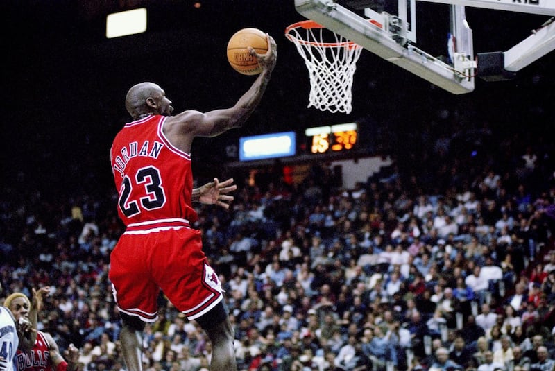 29 Nov 1997:  Guard Michael Jordan of the Chicago Bulls jumps to the basket during a game against the Washington Wizards at the US Airways Arena in Landover, Maryland.  The Bulls won the game 88-83. Mandatory Credit: Doug Pensinger  /Allsport / Getty Images