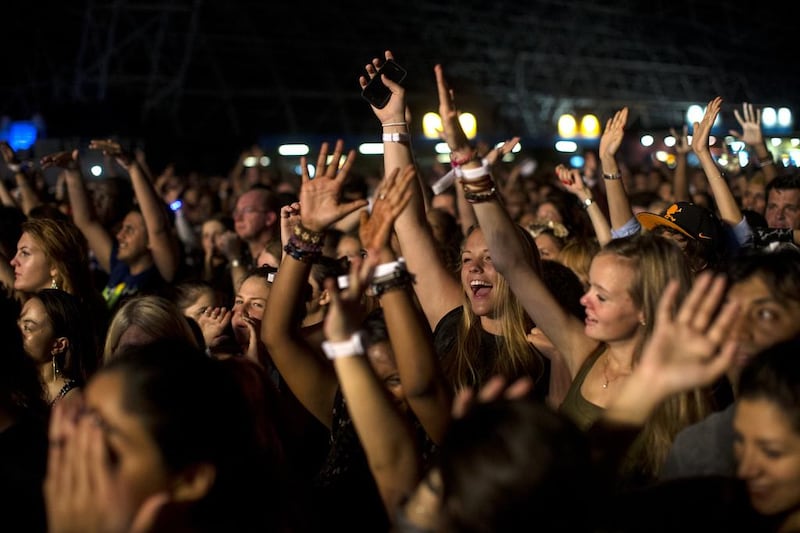 Fans wait for Rihanna to perform in concert at du Arena, Yas Island during the Abu Dhabi leg of the singer’s Diamonds World Tour on October 19, 2013. Christopher Pike / The National