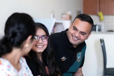 Rahul Bohra with his wife Pooja and daughter Rushda. The Dubai resident gets tested every other day to commute into the capital for work. Reem Mohammed / The National