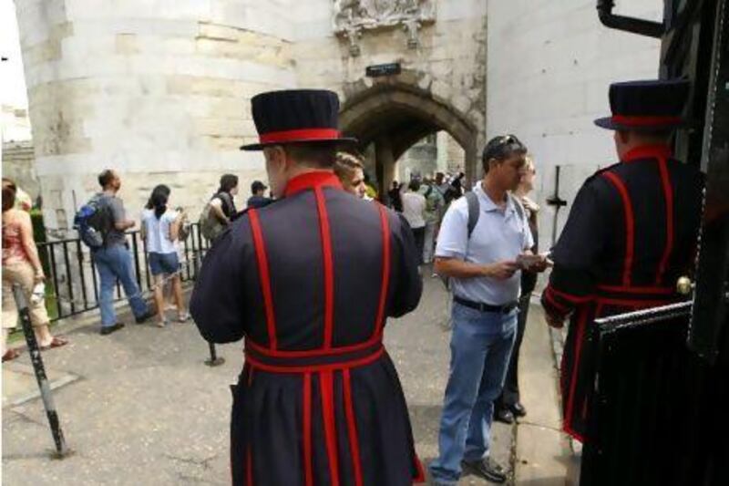 'Beefeaters' stand guard at the Tower of London yesterday as its former governor says he was fired after challenging illegal activities at the 900-year-old fortress.