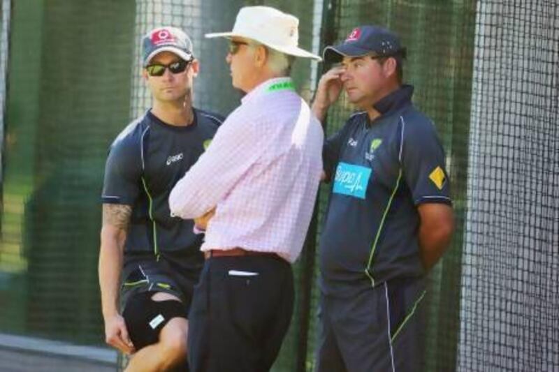 The Australia captain Michael Clarke, left, head coach Mickey Arthur, right, and selector chief John Inverarity will struggle to find a winning combination in time for the Ashes. Scott Barbour / Getty Images